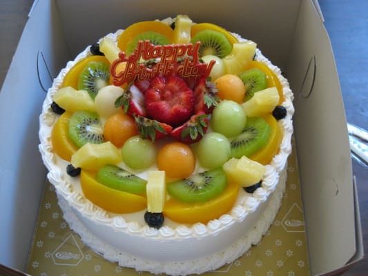 Strawberry filled cake with fruit topping Yelp