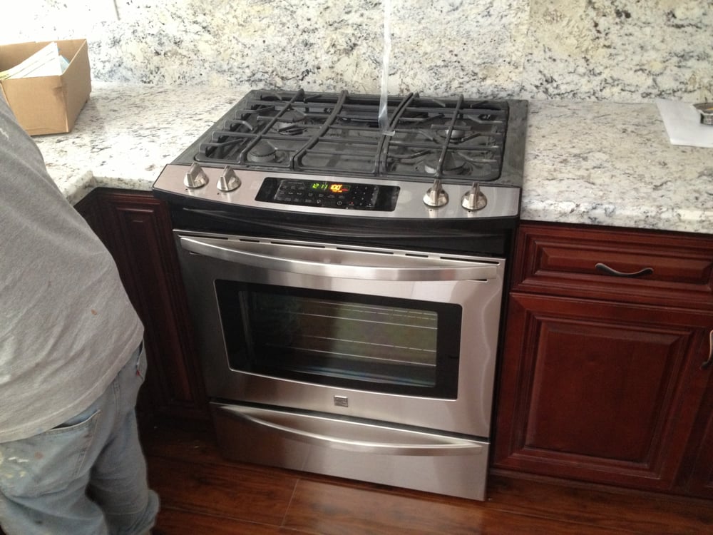 Slide In range install on White Granite Yelp